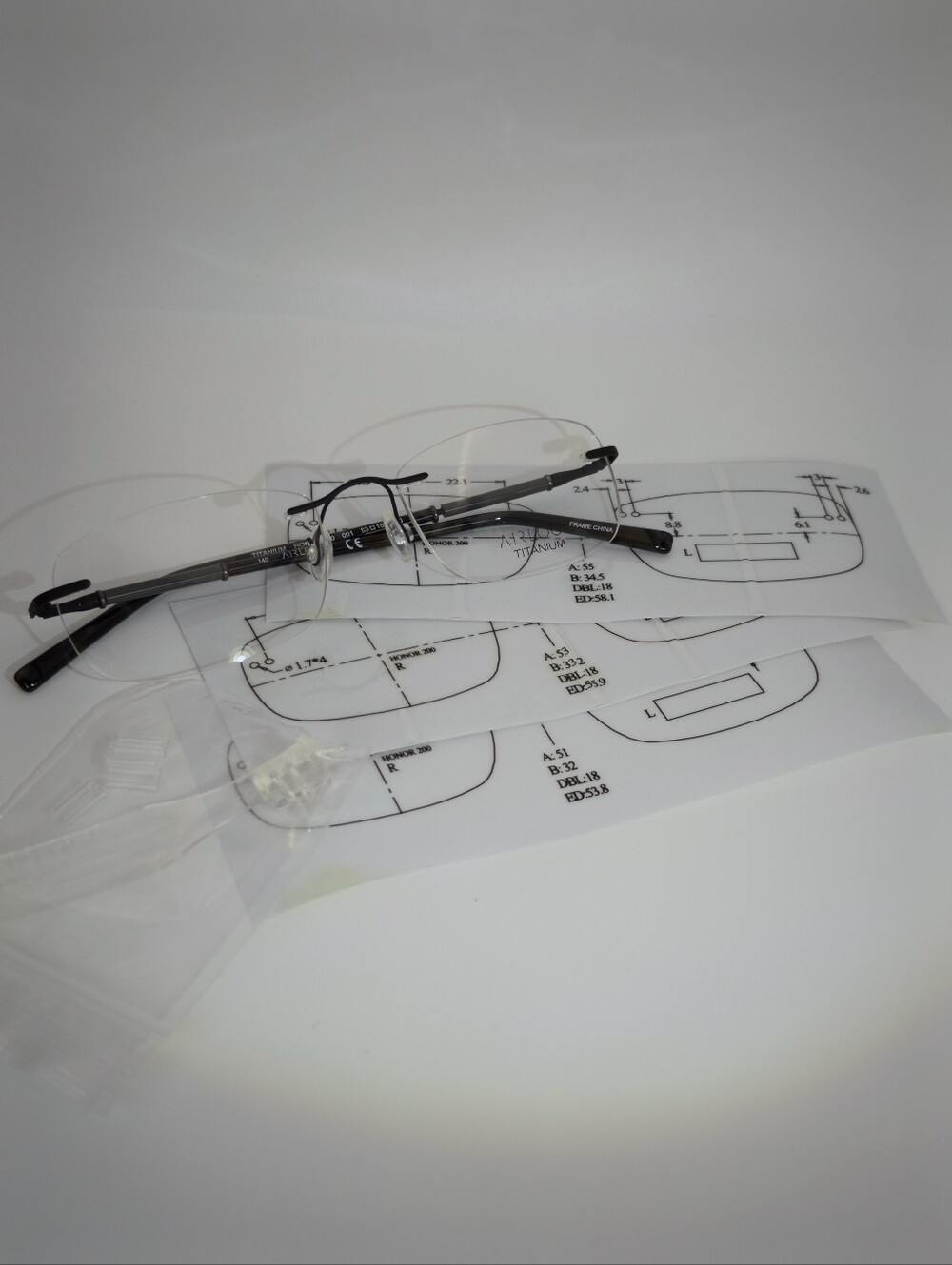 Airlock Titanium. Rimless Compression Mount. Patterns Mounting Bushing Inc.